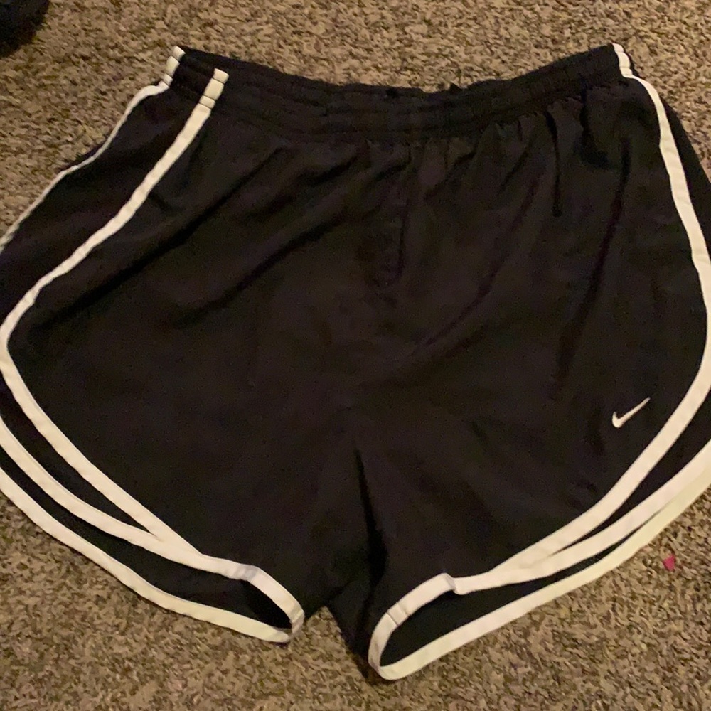 Black and white Nike running shorts